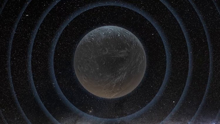 Représentation graphique de la Lune vibrant comme une cloche après un impact, illustrant la théorie selon laquelle elle pourrait être creuse.